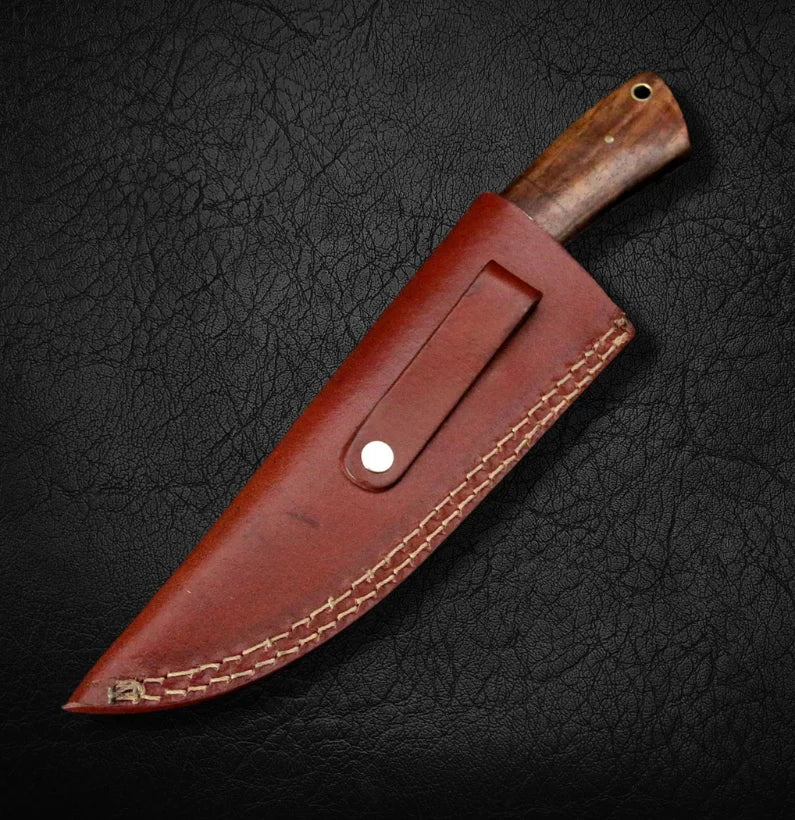 Brown leather knife sheath with wooden handle on a black textured background
