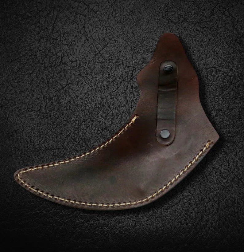 Brown leather knife sheath on a dark textured background