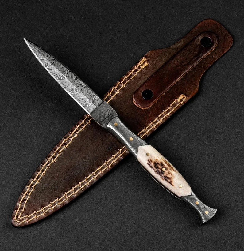 Decorative knife with a brown leather sheath on a dark background